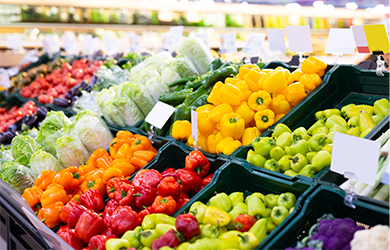 Fresh produce in bins at a grocery store